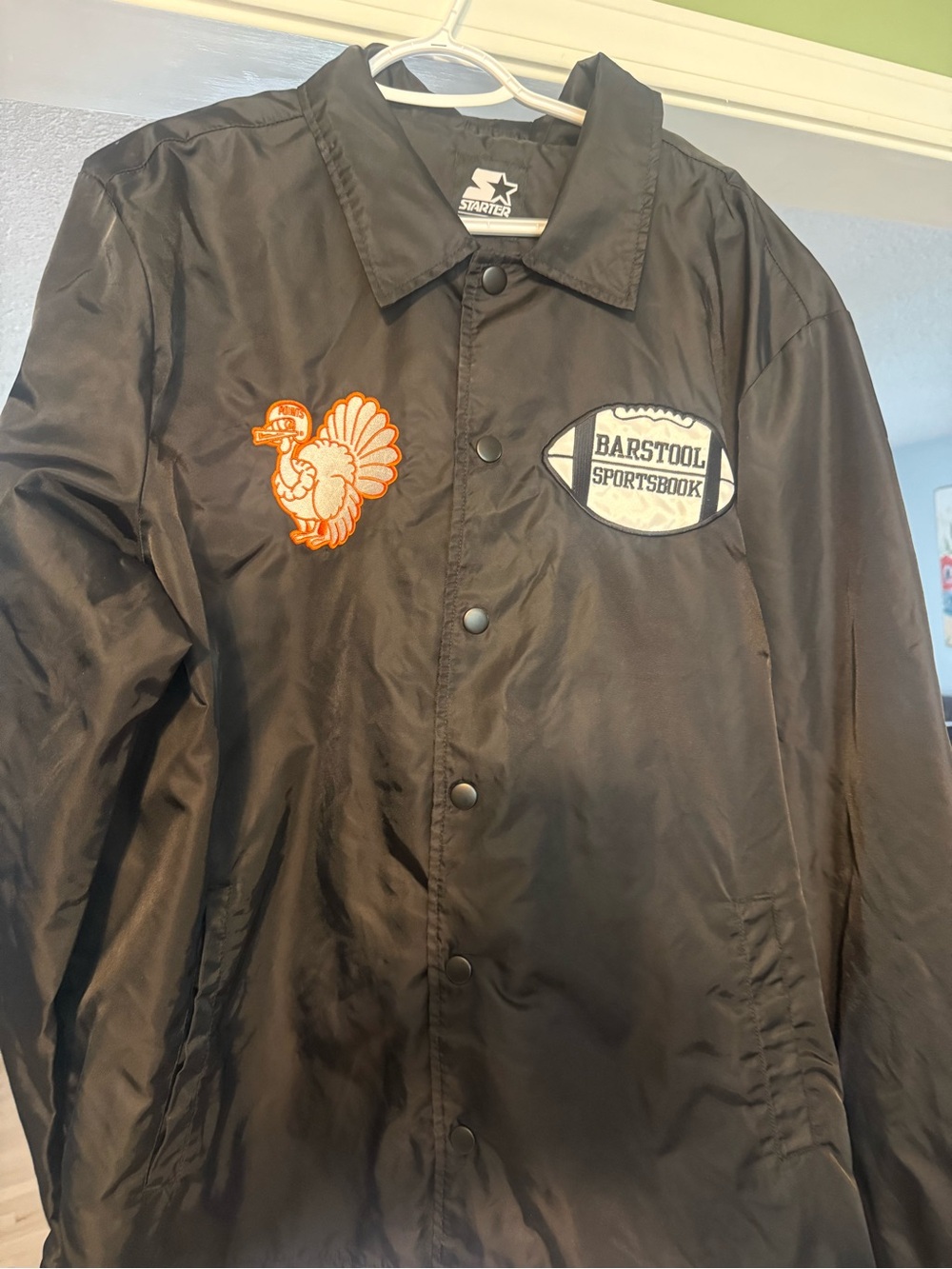 Starter Black Jacket with Barstool and Overs Club Sportsbook Patches